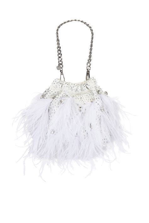 olga berg Livvy Feather Pouch in White | REVOLVE