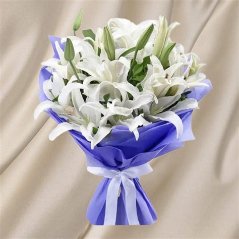 Buy / Send White Lily Bouquet Online in Noida | The Cake Man