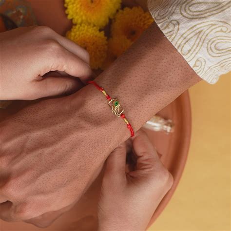 Peacock Feather 925 Silver Rakhi – PALMONAS