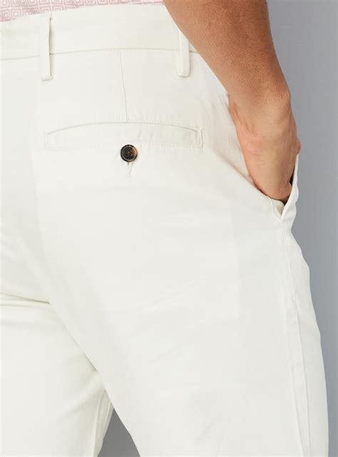 Buy Men Solid Straight Fit Chinos Online at just Rs. 1199.0 ...