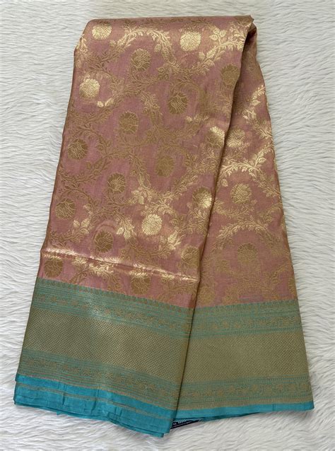 Banarasi Katan Silk Saree Peach colored Saree complemented with a Blue ...