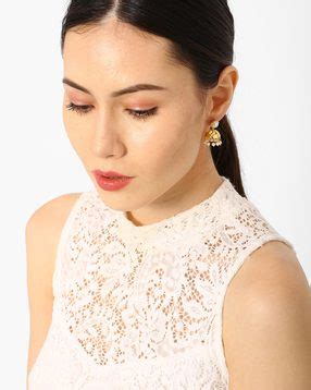 Shop earrings & ear cuffs online. Pick stylish earring designs at Ajio.com
