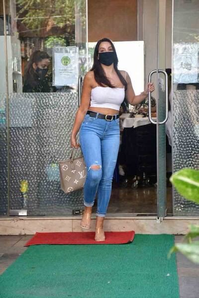 Nora Fatehi steps out in strappy cropped top, ripped jeans after salon ...