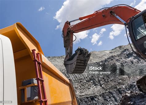 Image result for Large Excavators Loading Trucks
