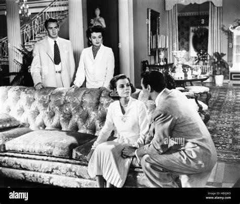 THE GREAT GATSBY, from left, Macdonald Carey, Ruth Hussey, Betty Field ...