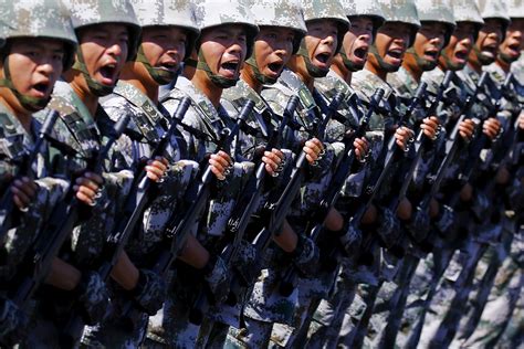 China Slams U.S. Over Military Report, Brands American 