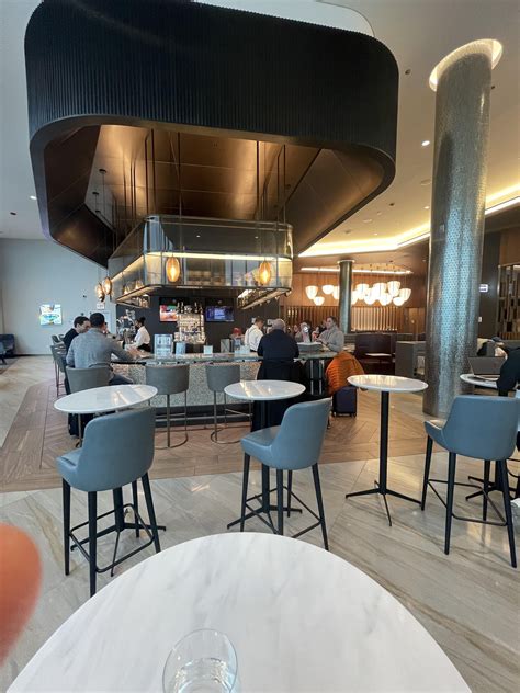Love the new lounge at ORD, same aesthetic as LGA. Boarding from the ...