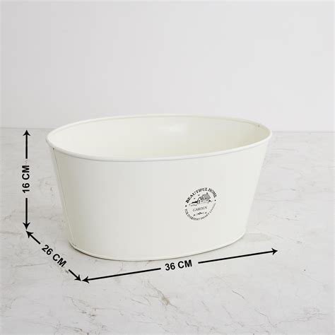 Buy Beautiful Home Metal Planter from Home Centre at just INR 1199.0