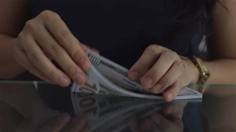 Hand holding money, money in hand 24324135 Stock Video at Vecteezy