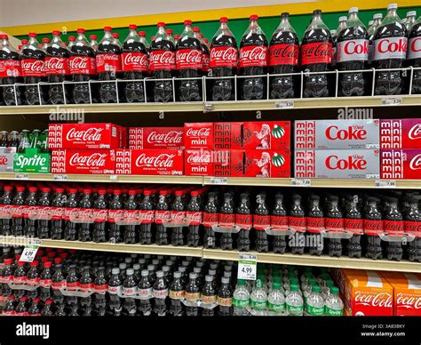 Variety of Coca Cola products on a store shelf Stock Photo - Alamy