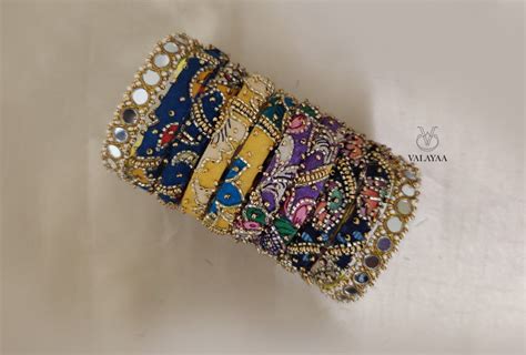 Kalamkari bangle paired with Mirror work corner bangle
