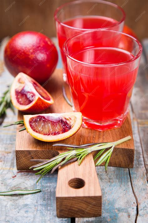 Premium Photo | Juice of red orange fruit
