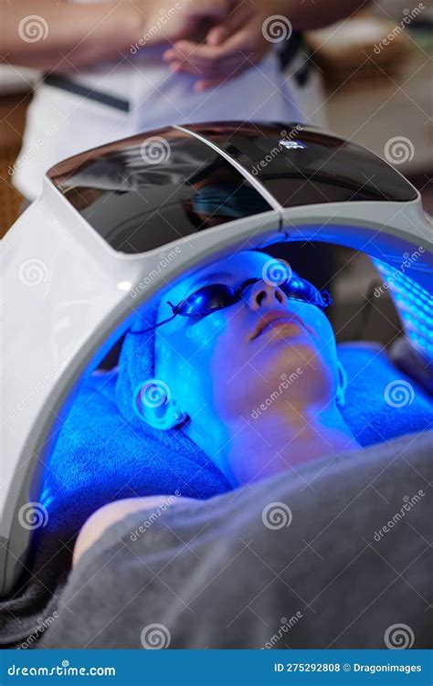 Blue Light Skin Treatment stock photo. Image of beautician - 275292808