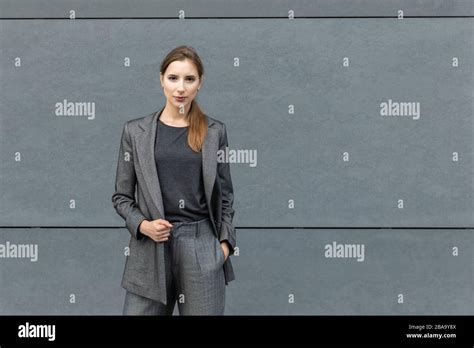 Woman in Grey Business Suit 的图像结果