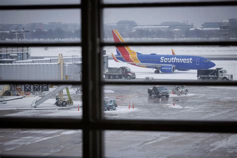Winter storm fuels thousands of flight delays and cancellations - The ...