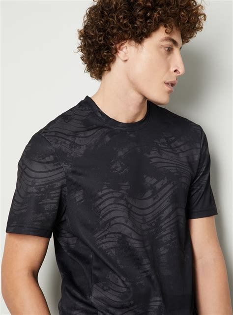 Buy Men Printed Sports T-shirt Online at just Rs. 799.0 - 1000015220135 ...