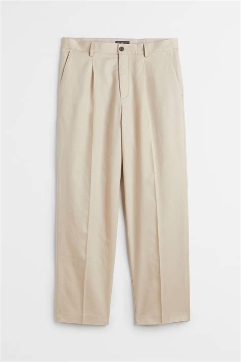 Relaxed Fit Linen-blend trousers - Beige - Men | H&M IN