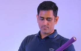 MS Dhoni Is Wearing Blue Sports Dress With Cricket Bat Standing In ...