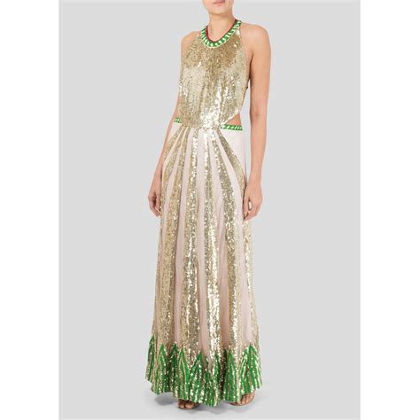 Download Temperley London Gold Green Colors Wallpaper | Wallpapers.com