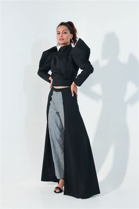 Black co-ord set features a structured crop top with side panel and gr ...