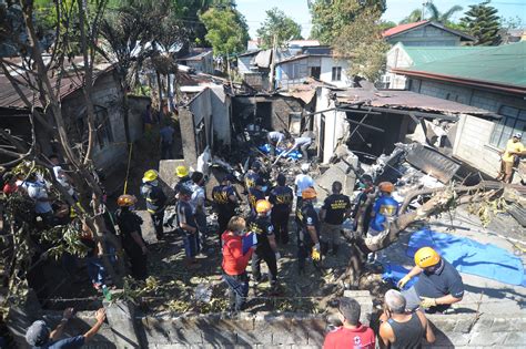 Philippines plane crashes into house near Manila killing 10 - CBS News