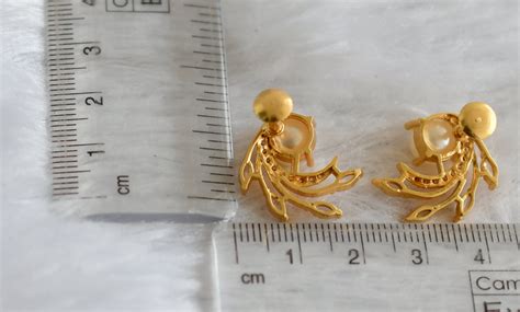 Gold tone cz white-pearl earrings dj-47259 – dreamjwell