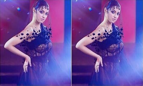 Divya Khosla Kumar in sheer black dress with net detailing channelizes ...