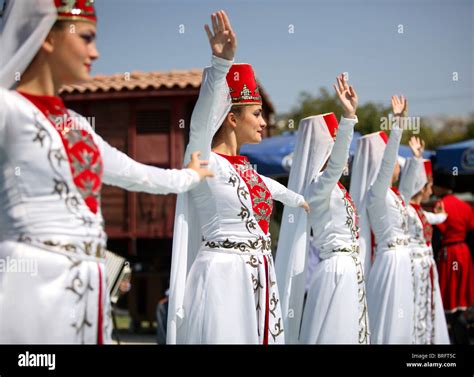 Turkish women wearing traditional clothes performing Anatolian dances ...