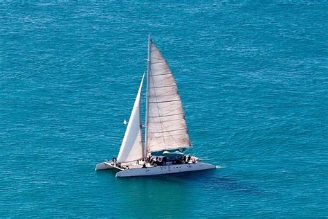 Tour of the bay of Dénia in a Grand Catamaran 2023 - Benidorm - Viator