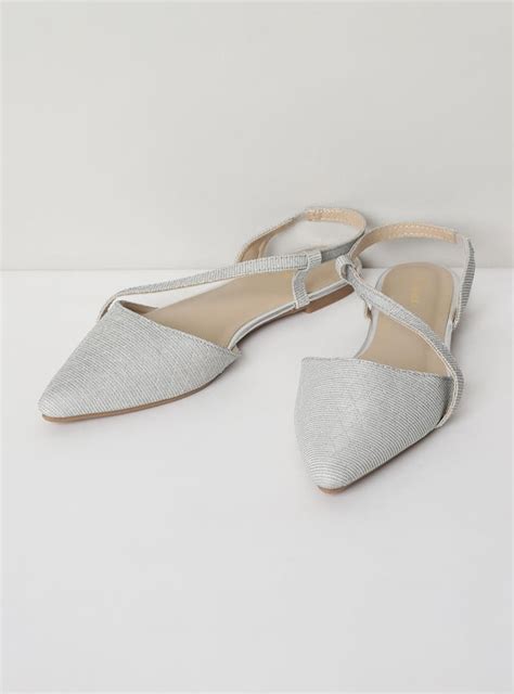 Buy Women Textured Sling Back Mules Online at just Rs. 899.0 ...
