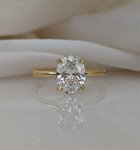 Oval Solitaire Engagement Rings Yellow Gold