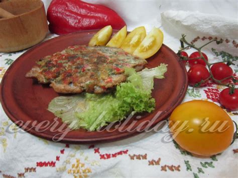 Отбивная из свинины с овощами в духовке
