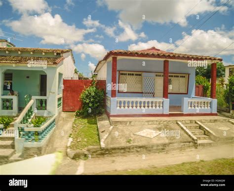 Private simple low budget colorful houses in Cuba Stock Photo - Alamy