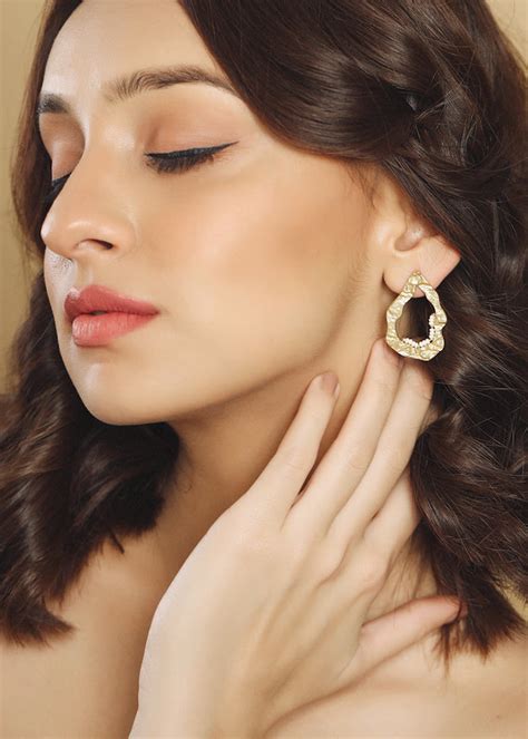 Get Bead Detail Beaten Abstract Big Studs at ₹ 1800 | LBB Shop