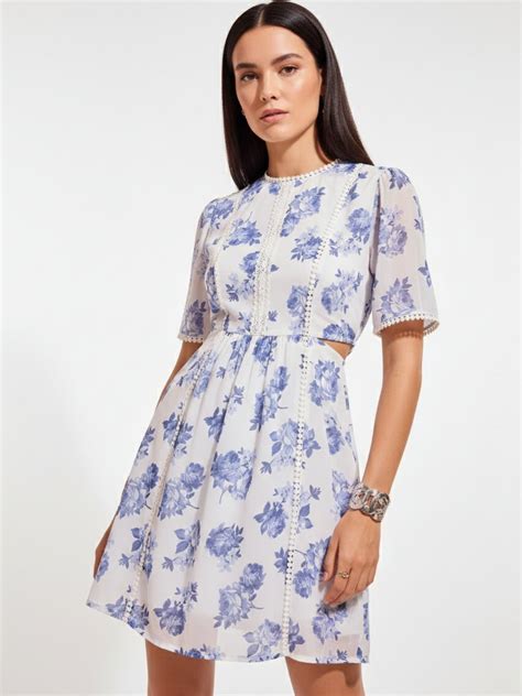 Shop White Mini Fit And Flare Dress With Cut Out Detail - for Women ...