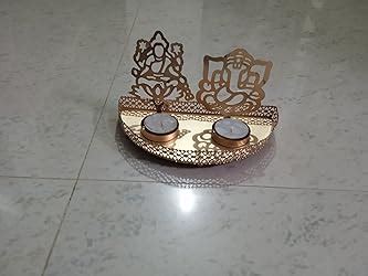 Buy STITCHNEST Metal Divine Shadow Ganesh and Lakshmi Diya | Tealight ...