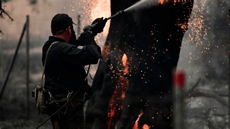 In pics: Greece continues to battle wildfires, Evia residents evacuated ...