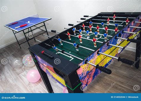 Ping Pong Table with Table Soccer in a Playroom Stock Photo - Image of ...