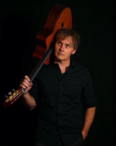 Stringing Nylon String Guitar 的图像结果