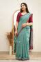 Trendy Turquoise Green And Maroon Checked Saree
