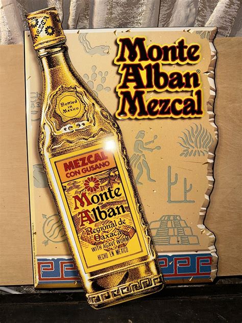 Download Monte Alban Mezcal Tequila Tin Bar Sign Wallpaper | Wallpapers.com