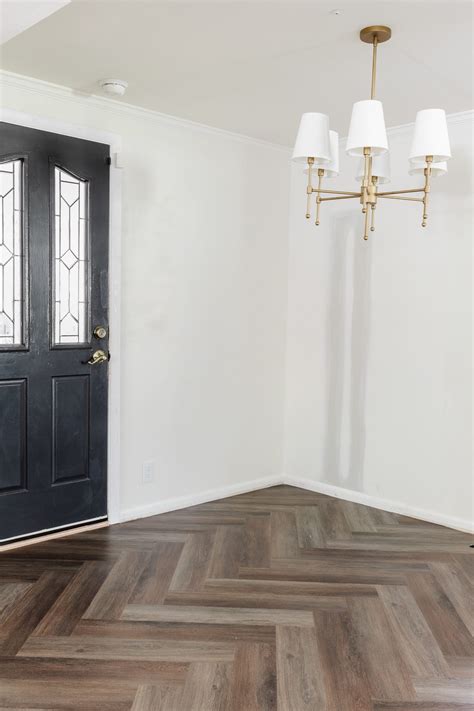 How to Install a Herringbone LVP Floating Floor Over Tile - DESIGN IT ...