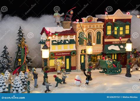 Miniature Christmas Village Scene Stock Photo - Image of gold, happy ...