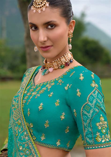 Turquoise Green Silk Lehenga with Heavily Embroidered Panels – Anant ...