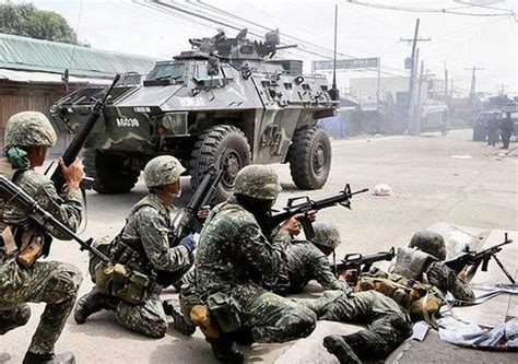 菲律宾军方空袭反政府武装以回应撕票威胁 - 中国日报网