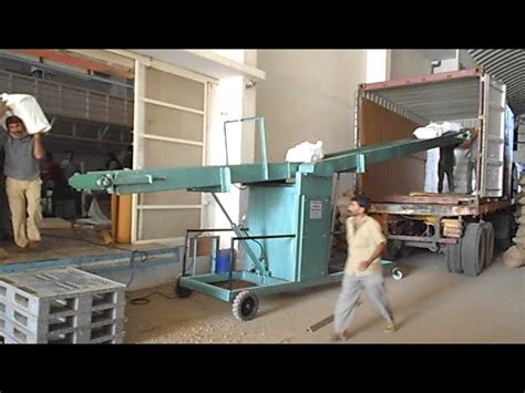 Mobile Conveyor System - Bag Truck Loading Conveyor In Ahmedabad ...