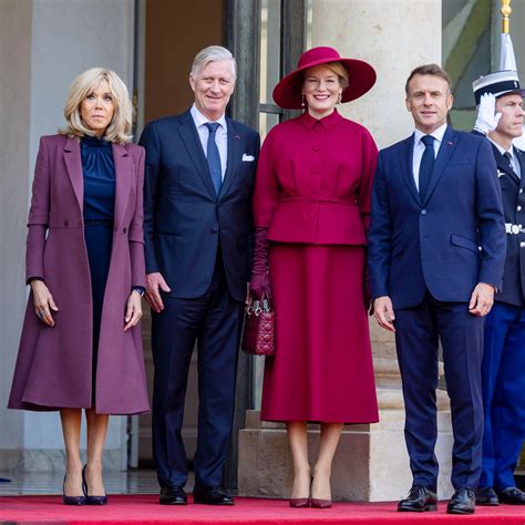 Queen Mathilde in Burgundy Dior Outfit During Paris Visit