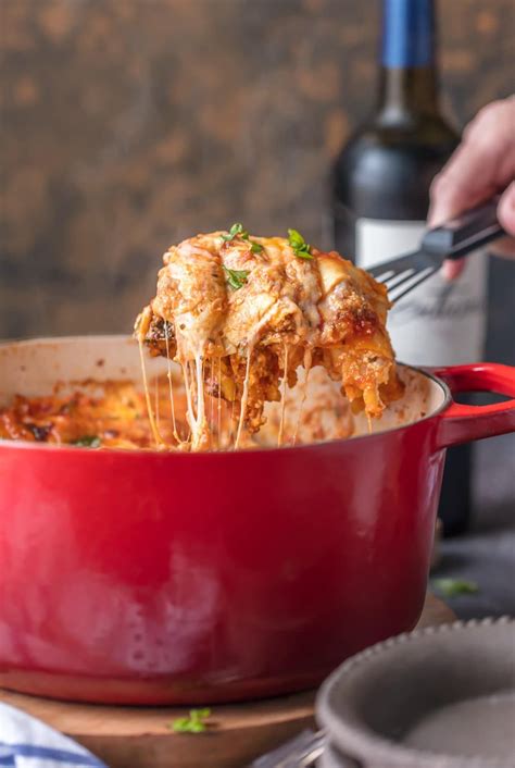This DUTCH OVEN LASAGNA will blow your mind! You'll never  