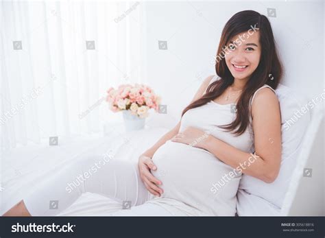 Pregnant Woman Asian: Over 46,438 Royalty-Free Licensable Stock Photos ...