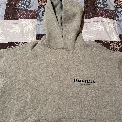 grey essentials hoodie Fear of God Brand New Sizes... - Depop
